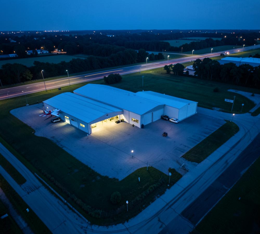 Aerial view of the Aero Virgin Space hangar complex at dusk